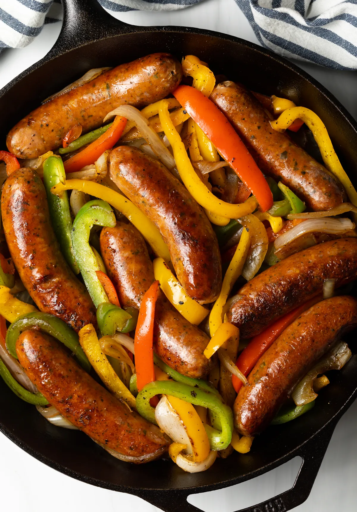 Sausage cooked with veggies in the oven